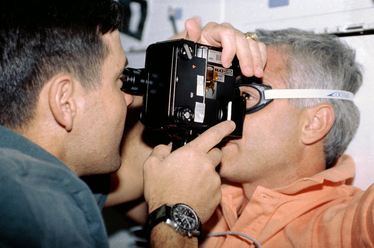 STS053-02-007 (2 - 9 Dec 1992) --- Astronaut Robert D. Cabana, pilot, uses a tonometer to check the intraocular pressure of astronaut Michael R. U. (Rich) Clifford, mission specialist.  The two are on the Space Shuttle Discovery's mid-deck.  This test is one of the mission's Detailed Supplementary Objectives (DSO) 472.  The purpose of this DSO is to establish a data base of changes in intraocular pressures that can be used to evaluate crew health.