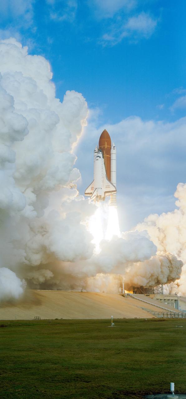 STS053-S-056 (2 Dec 1992) --- The Space Shuttle Discovery, with a crew of five astronauts onboard, launches from Kennedy Space Center's (KSC) Pad 39A at 8:24:00 a.m. (EST), December 2, 1992.  The all military crew supporting the Department of Defense (DOD) flight included astronauts David M. Walker, Robert D. Cabana, Guion S. Bluford Jr., James S. Voss and Michael R. U. (Rick) Clifford.