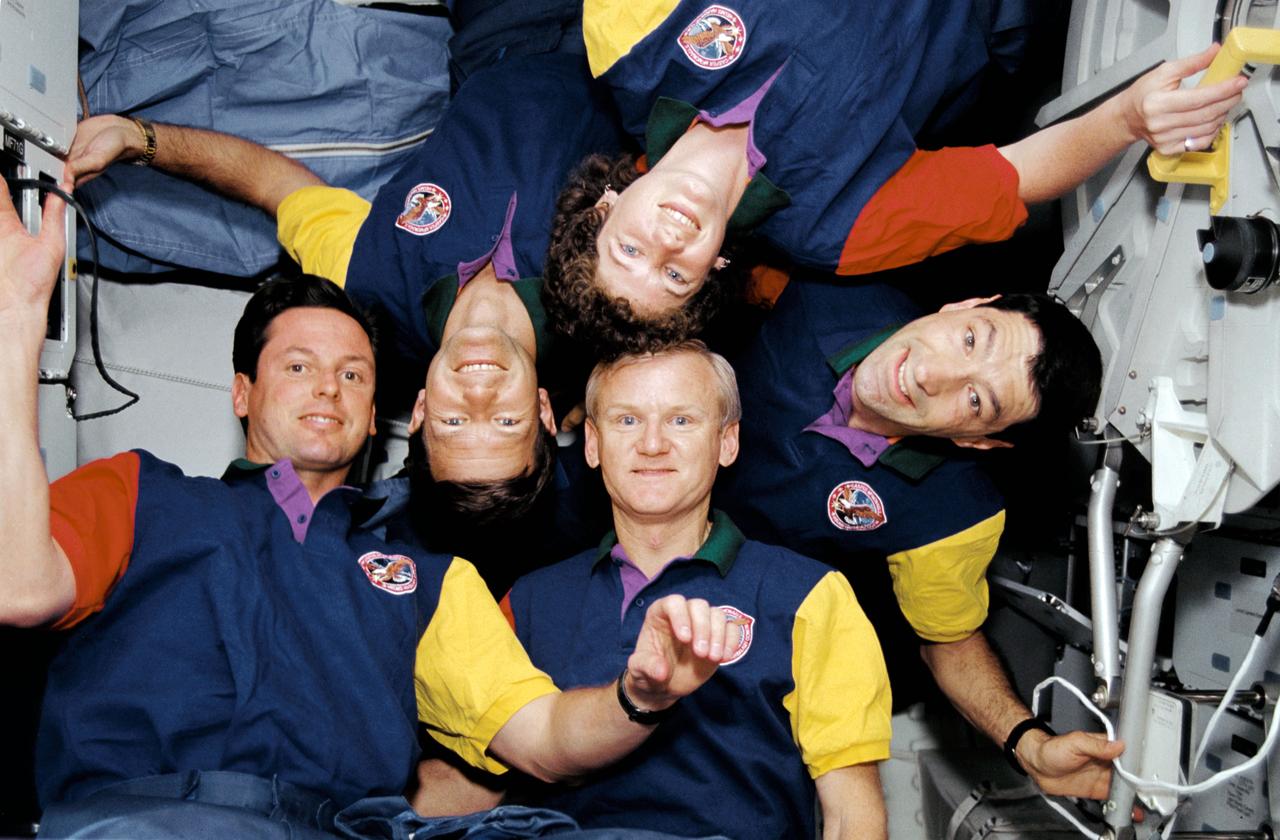 STS054-02-008 (13-19 Jan. 1993) --- The traditional inflight crew portrait has, (clockwise), Susan J. Helms, Mario Runco Jr., both mission specialists, John H. Casper, mission commander, Donald R. McMonagle, pilot, and Gregory J. Harbaugh, mission specialist.  This frame was taken with a 35mm camera aboard the Earth-orbiting Space Shuttle Endeavour during the six-day mission.