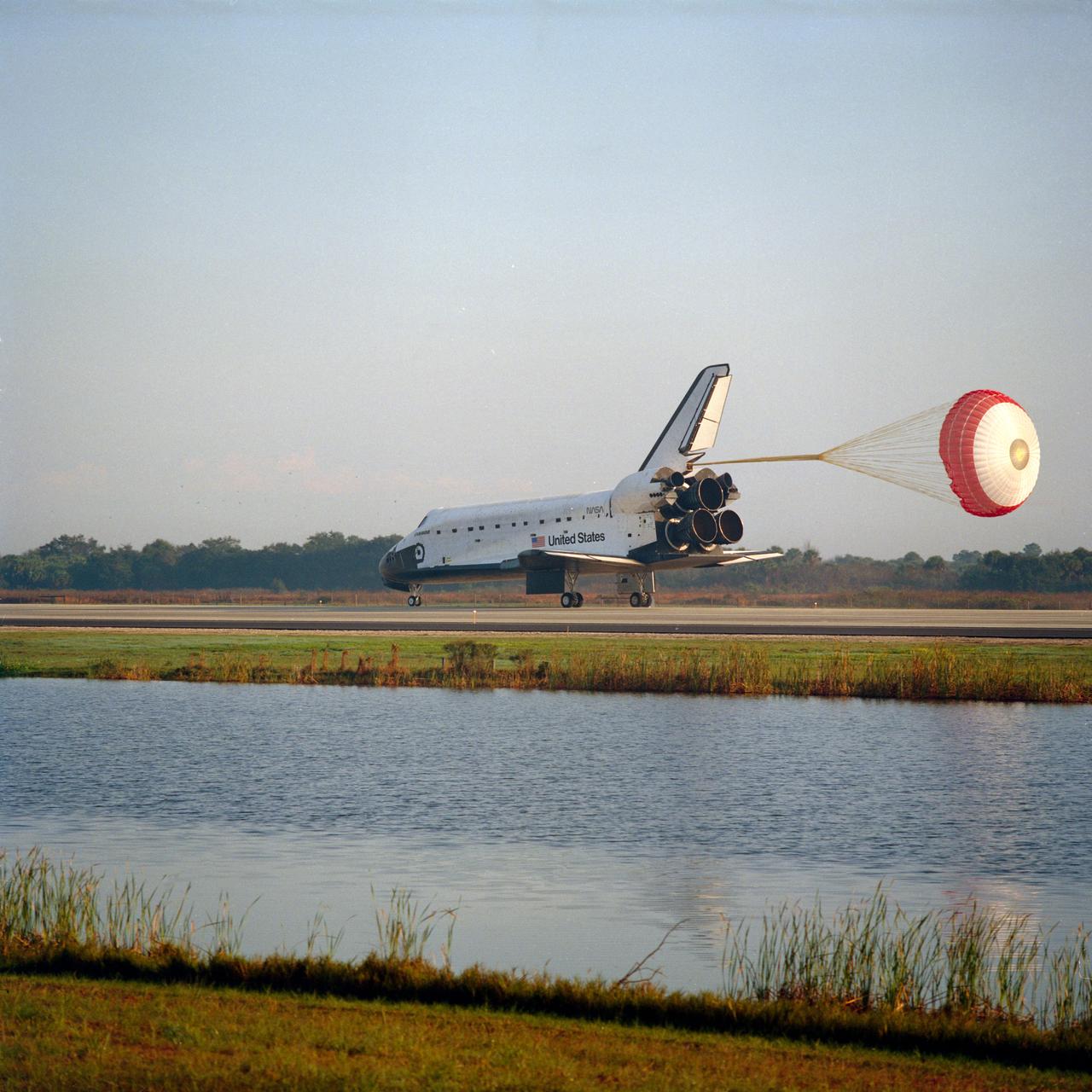 STS054-S-100 (19 Jan 1993) --- The drag chute is fully deployed as the Space Shuttle Endeavour rolls toward wheelstop at KSC's Shuttle landing facility. Landing occurred at 8:38 a.m. (EST), Jan. 19, 1993.  Onboard for the six-day mission were astronauts John H. Casper, mission commander, Donald R. McMonagle, pilot, Gregory J. Harbaugh, Mario Runco Jr. and Susan J. Helms, mission specialists.