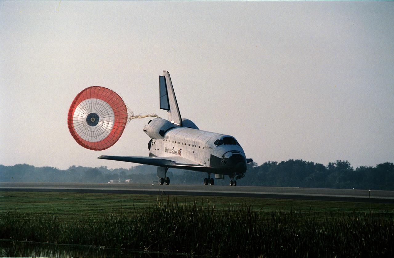 STS054-S-101 (19 Jan 1993) --- The drag chute is just about to be released as the Space Shuttle Endeavour rolls toward wheelstop at KSC's Shuttle landing facility. Landing occurred at 8:38 a.m. (EST), Jan. 19, 1993.  Onboard for the six-day mission were astronauts John H. Casper, mission commander, Donald R. McMonagle, pilot, Gregory J. Harbaugh, Mario Runco Jr. and Susan J. Helms, mission specialists.