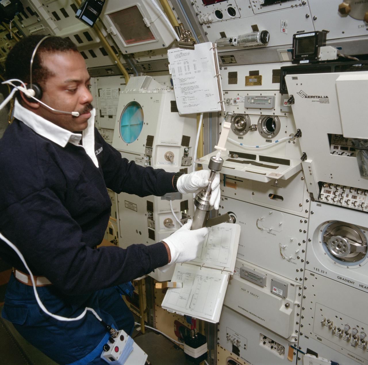 STS055-106-048 (26 April-6 May 1993) --- Astronaut Bernard A. Harris, Jr., mission specialist, works with a sample at the Heater Facility, part of the Werkestofflabor material sciences laboratory in the Spacelab D-2 Science Module aboard the Space Shuttle Columbia.  Harris was joined by four other NASA astronauts and two German payload specialists for the 10-day mission aboard the Space Shuttle Columbia.