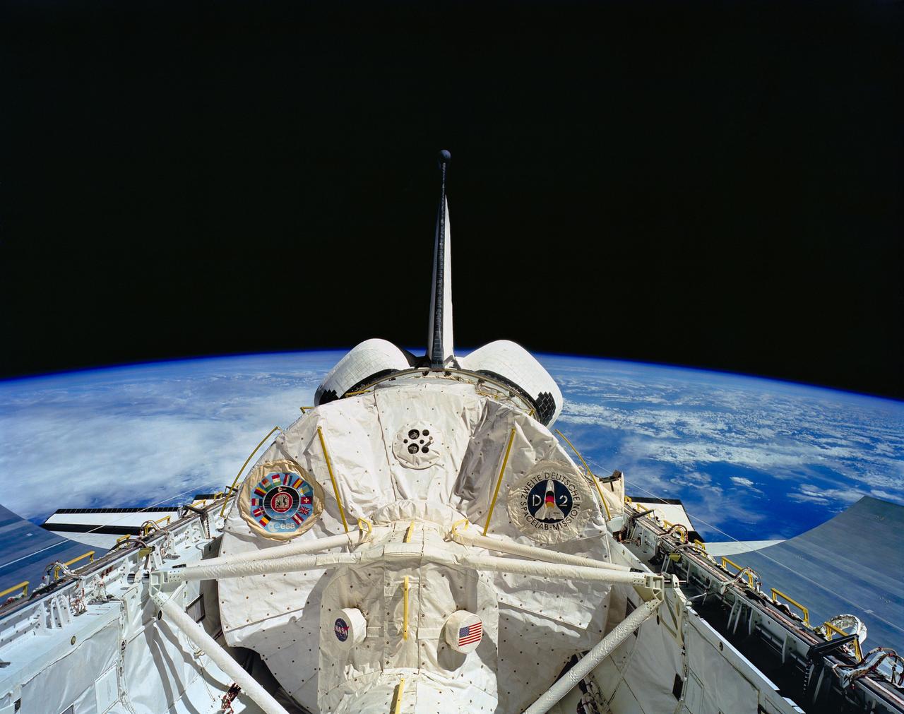 STS055-151B-189 (26 April-6 May 1993) --- Clouds over a wide span of ocean waters form the backdrop for this picture of the Spacelab D-2 Science Module in the Space Shuttle Columbia's cargo bay.  A Linhof camera was aimed through the spacecraft's aft flight deck windows to record the scene.
