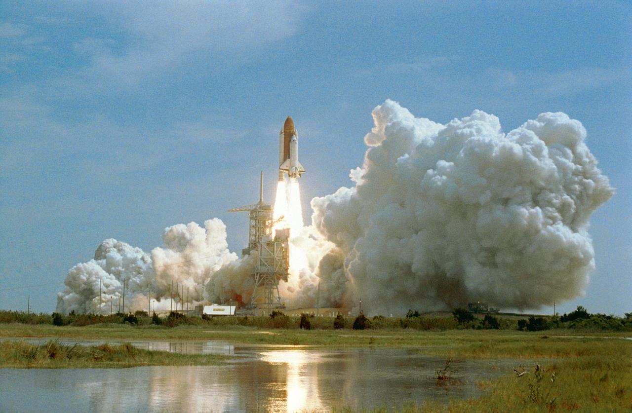 STS055-S-052 (26 April 1993) --- A wide shot shows the STS-55 launch at the Kennedy Space Center. Carrying an international crew of seven and a science laboratory, the Space Shuttle Columbia was on its way for a nine-day Earth-orbital mission in support of the Spacelab D-2 mission.  Onboard were astronauts Steven R. Nagel, mission commander; Terence T. (Tom) Henricks, pilot; Jerry L. Ross, payload commander; Charles J. Precourt and Bernard A. Harris Jr., mission specialists; along with German payload specialists Hans Schlegel and Ulrich Walter. Liftoff occurred at 10:50 a.m. (EDT), April 26, 1993.