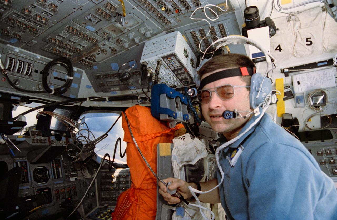 STS056-30-022 (8-17 April 1993) --- Aboard Discovery, astronaut Kenneth D. Cameron (call letters N5AWP), talks to amateur radio operators on Earth via the Shuttle Amateur Radio Experiment (SAREX).  SAREX was established by NASA, the American Radio League\Amateur Satellite Corporation and the Johnson Space Center Amateur Radio Club to encourage public participation in the space program. It is part of an endeavor to demonstrate the effectiveness of conducting short-wave radio transmissions between the Shuttle and ground-based radio operators at low cost ground stations with amateur and digital techniques.  As on several previous missions, SAREX was used on this flight as an educational opportunity for students around the world to learn about space firsthand by speaking directly to astronauts aboard the Shuttle.