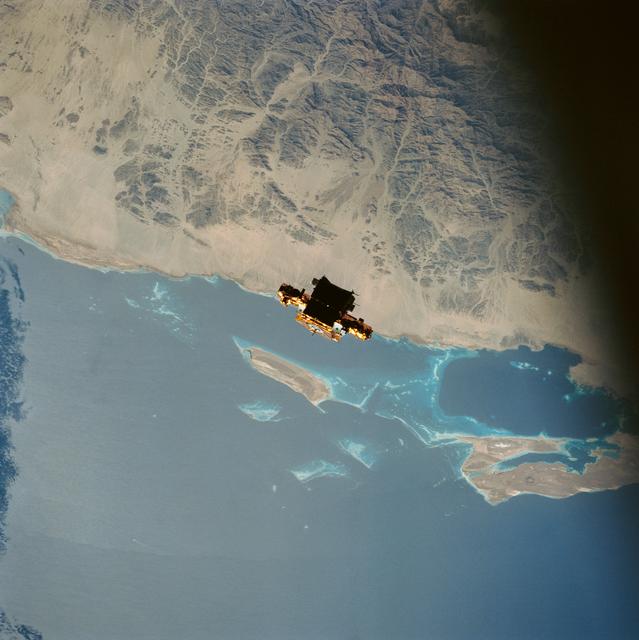 NASA image: STS-56 freeflying SPARTAN-201 backdropped over the Red Sea coast of Sudan