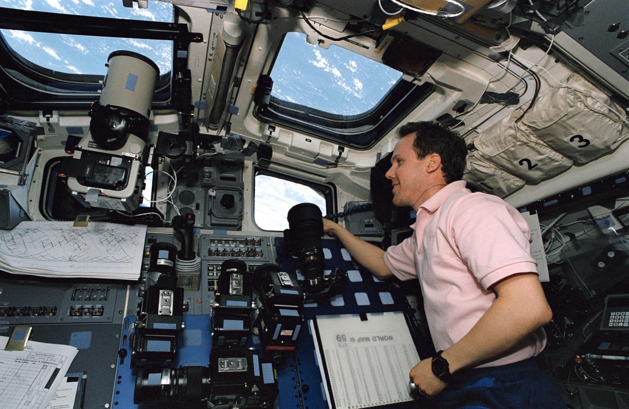 STS059-09-021 (9-20 April 1994) --- Astronaut Thomas D. Jones, mission specialist, monitors a number of cameras fixed on targets of opportunity as the Space Shuttle Endeavour orbits Earth.  Jones is one of six NASA astronauts supporting the week and half Space Radar Laboratory (SRL-1) mission.  He has been assigned as payload commander for SRL-2, scheduled to fly later this year.