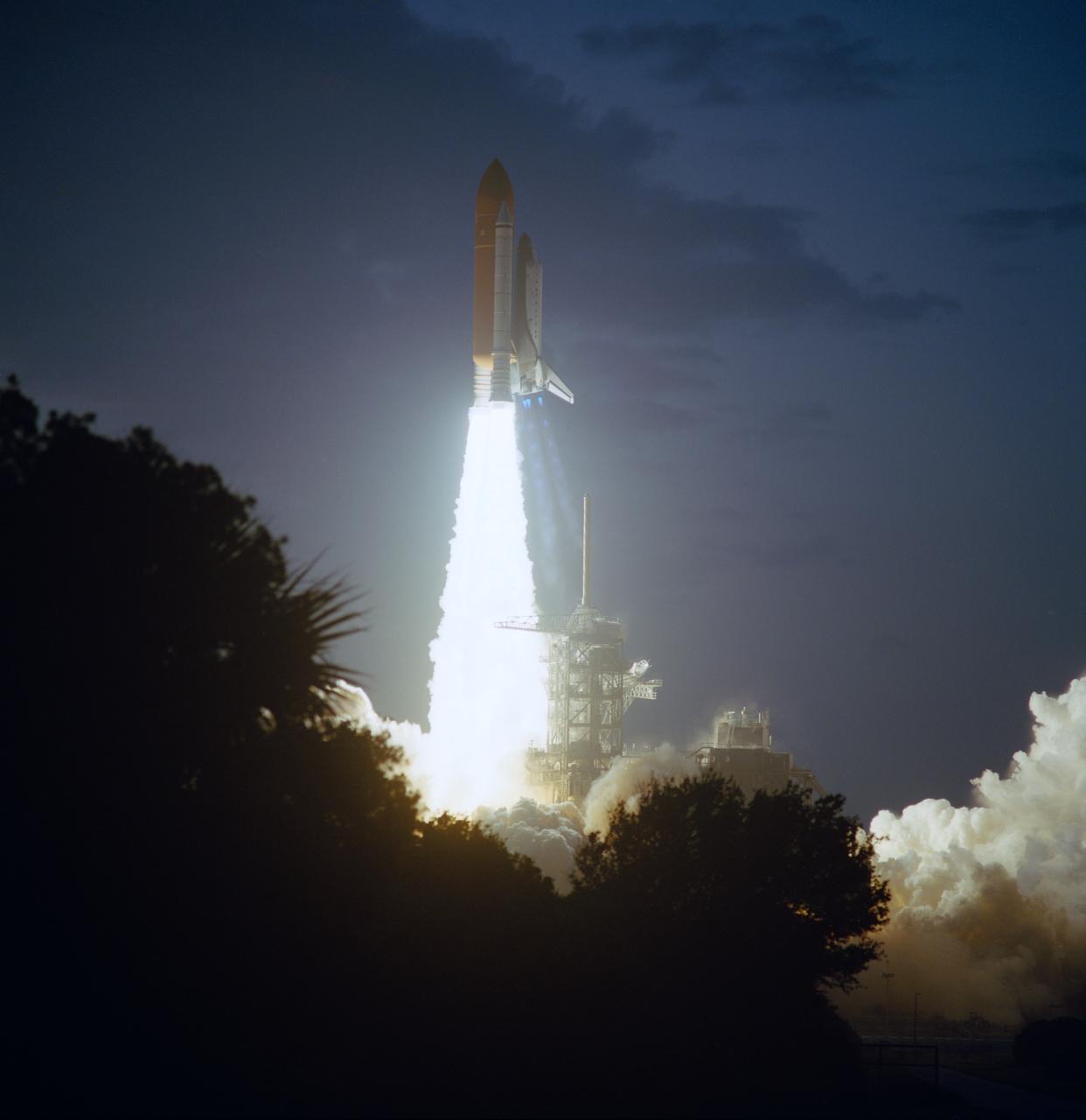 STS059-S-036 (9 April 1994) --- The liftoff of the Space Shuttle Endeavour is backdropped against a dawn sky at the Kennedy Space Center (KSC) as six NASA astronauts head for a week and a half in Earth orbit. The morning sky allows for a contrasting backdrop for the diamond shock effect of the thrust from Endeavour's main engines. Liftoff occurred at 7:05 a.m. (EDT), April 9, 1994. Onboard for the Space Radar Laboratory (SRL-1) mission were astronauts Sidney M. Gutierrez, Kevin P. Chilton, Jerome (Jay) Apt, Linda M. Godwin, Michael R. U. (Rich) Clifford and Thomas D. Jones.