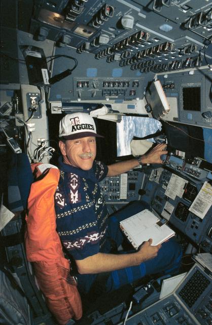 NASA image: Astronaut Richard Covey at commander's station in Endeavour during STS-61