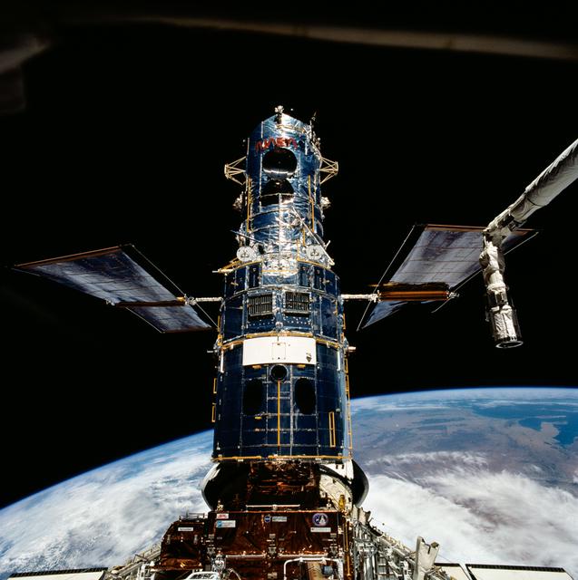 NASA image: Hubble Space Telescope is berthed in Endeavour's payload bay after capture