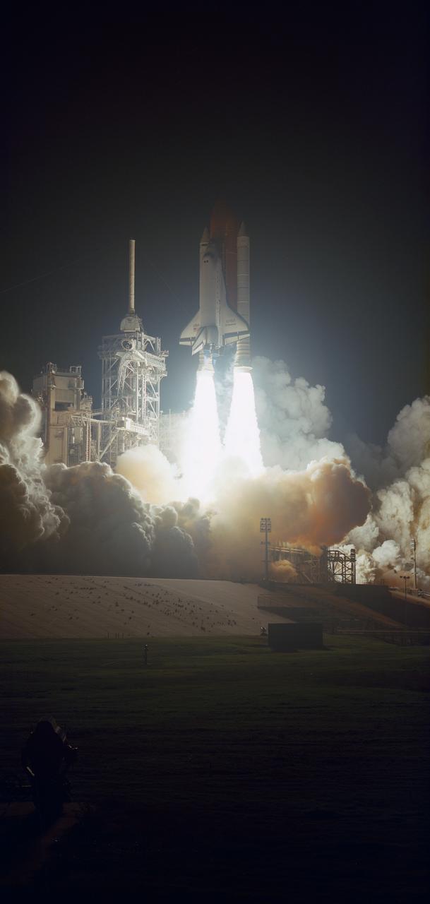 STS061-S-088 (2 Dec 1993) --- The Space Shuttle Endeavour lifts off from Launch Pad 39B with a crew of six NASA astronauts, a Swiss mission specialist and a variety of special tools aboard.  Launch occurred at 4:27:00 a.m. (EST), December 2, 1993.  The seven member crew will team to perform a variety of service tasks on the Hubble Space Telescope (HST).  Four of the group will break into pairs on alternating sessions to carry out a total of five days Extravehicular Activity (EVA).  Onboard are astronauts Richard O. Covey, Kenneth D. Bowersox, F. Story Musgrave, Kathy C. Thornton, Jeffrey A. Hoffman and Thomas D. Akers, along with Swiss scientist Claude Nicollier.