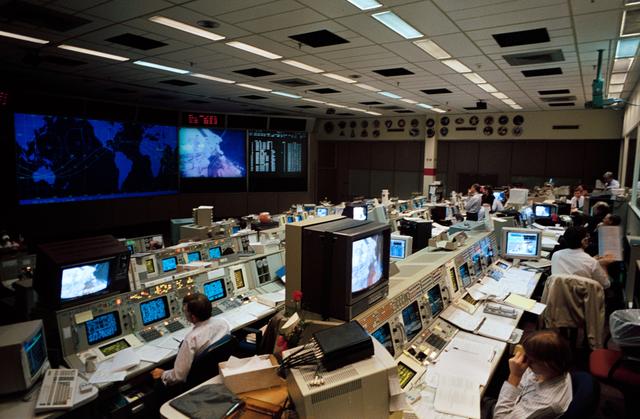 NASA image: Flight controller Kevin McCluney monitors STS-61 astronauts during EVA