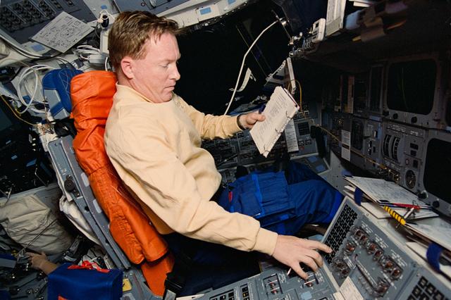 Astronaut Richards initiates thruster firing during SPIFEX operations