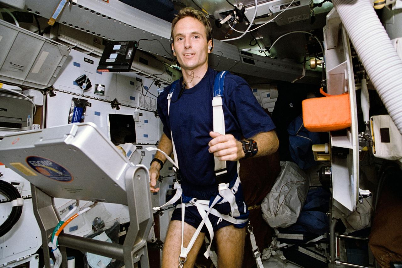 STS064-41-006 (9-20 Sept. 1994) --- Astronaut Jerry M. Linenger, STS-64 mission specialist, works out on the treadmill device on the space shuttle Discovery's middeck. "Running was a pleasure...just like being back on Earth," Linenger told a large audience of Johnson Space Center employees at the Crew Employee Presentation on Sept. 29, 1994. Linenger joined five other NASA astronauts for almost 11 days in Earth orbit aboard Discovery. Photo credit: NASA or National Aeronautics and Space Administration