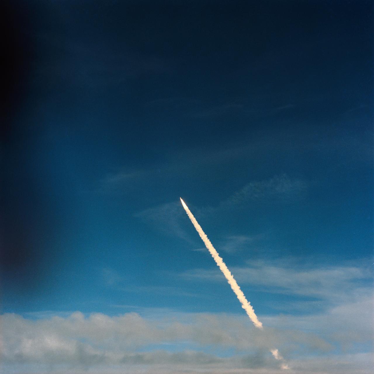 STS064-S-044 (9 Sept. 1994) --- Passing through some of the trailer clouds of an overcast sky which temporarily postponed its launch, the space shuttle Discovery heads for its 19th Earth-orbital flight. Several kilometers away, astronaut John H. Casper Jr., who took this picture, was piloting the Shuttle Training Aircraft (STA) from which the launch and landing area weather was being monitored.  Onboard Discovery were astronauts Richard N. Richards, L. Blaine Hammond Jr., Mark C. Lee, Carl J. Meade, Susan J. Helms and Jerry M. Linenger. Photo credit: NASA or National Aeronautics and Space Administration