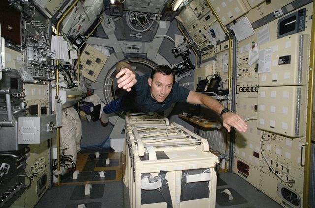 STS-65 Mission Specialist Walz in IML-2 spacelab aboard Columbia, OV-102