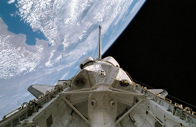 NASA image: STS-65 IML-2 spacelab module in Columbia's payload bay with Earth background