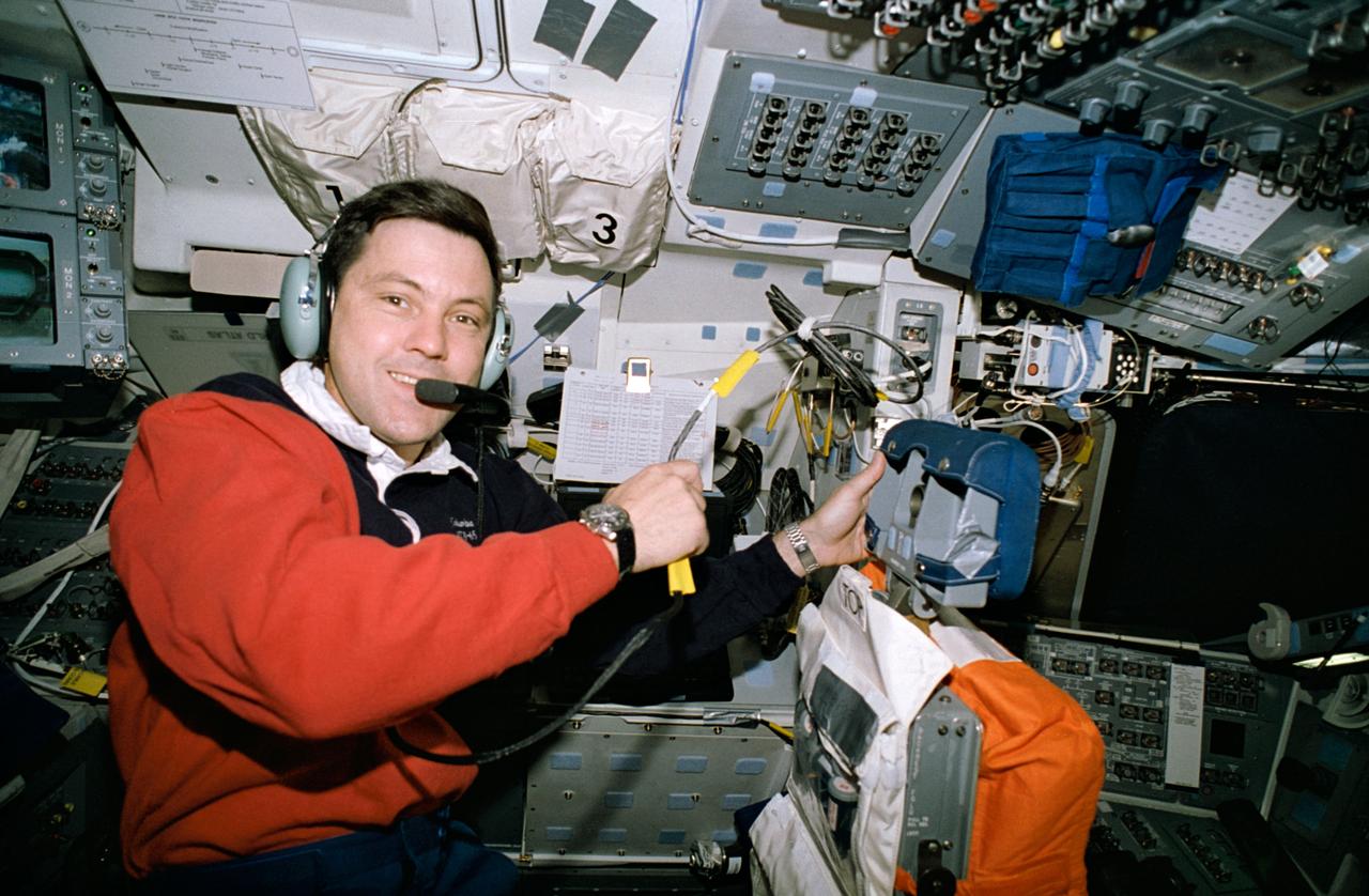 STS065-44-014 (8-23 July 1994) --- Astronaut Robert D. Cabana, mission commander, is seen on the Space Shuttle Columbia's flight deck with the Shuttle Amateur Radio Experiment (SAREX).  SAREX was established by NASA, the American Radio League/Amateur Radio Satellite Corporation and the Johnson Space Center (JSC) Amateur Radio Club to encourage public participation in the space program through a project to demonstrate the effectiveness of conducting short-wave radio transmissions between the Shuttle and ground-based radio operators at low-cost ground stations with amateur and digital techniques.  As on several previous missions, SAREX was used on this flight as an educational opportunity for students around the world to learn about space firsthand by speaking directly to astronauts aboard the Shuttle.