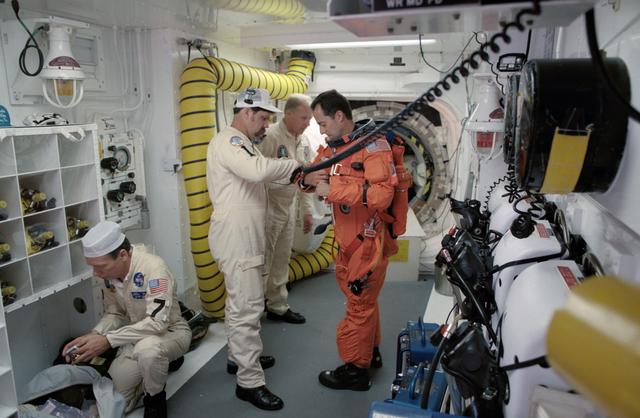 NASA image: Astronaut Jean-Francois Clervoy in white room on launch pad 39B