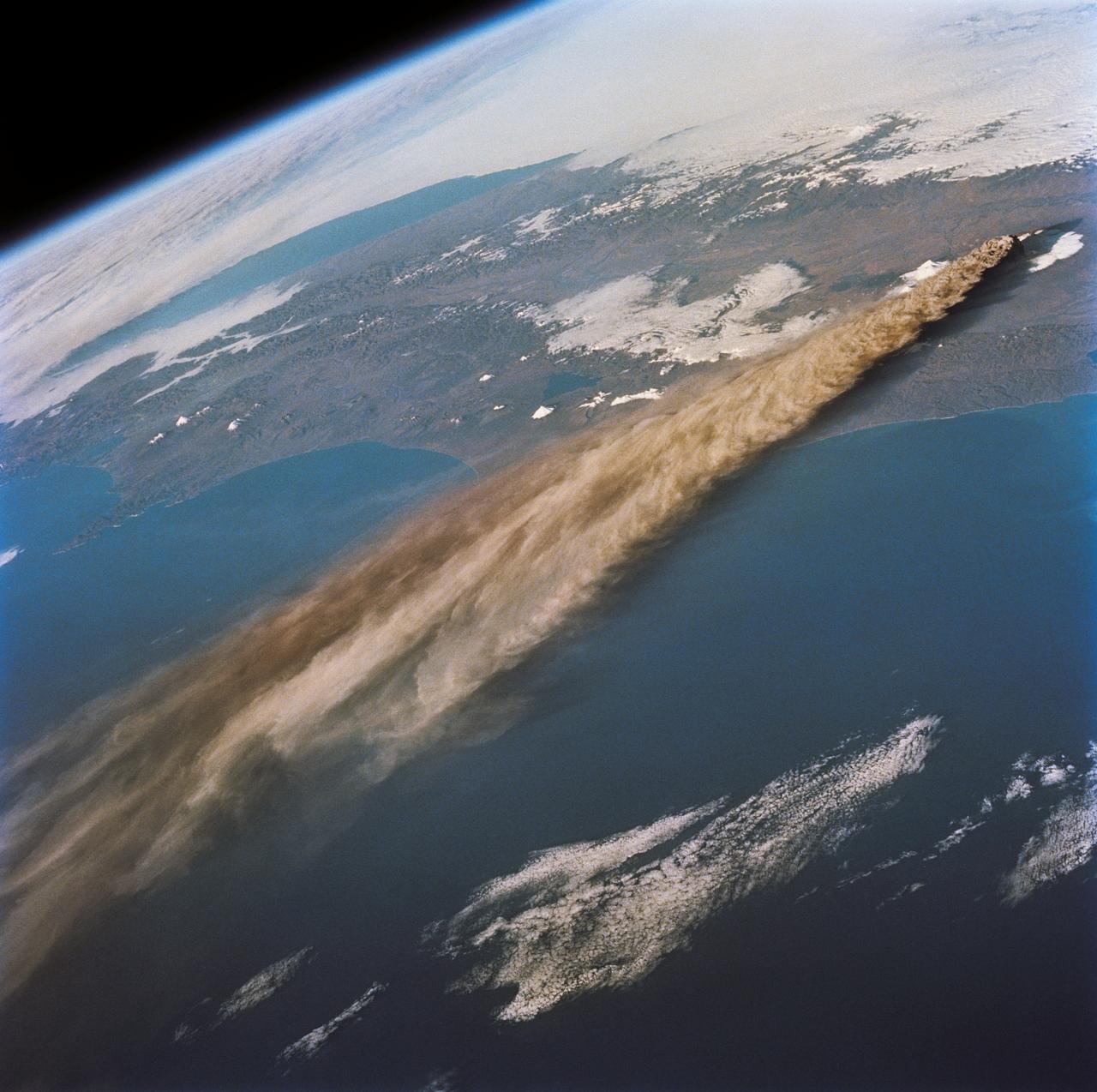 STS068-218-007 (30 September-11 October 1994) --- (Kliuchevskoi Volcano) The crewmembers used a 70mm camera to photograph this northeasterly looking view of the plume from the Kamchatka peninsula's newly erupted volcano.  The eruption was photographed from 115 nautical miles above Earth.  Six NASA astronauts spent a week and a half aboard the Space Shuttle Endeavour in support of the Space Radar Laboratory 2 (SRL-2) mission.