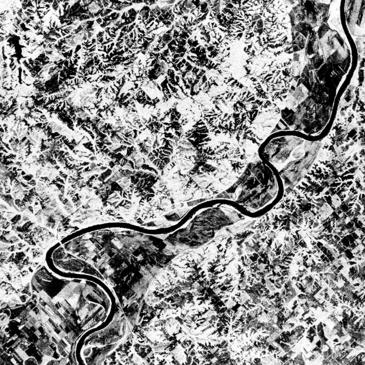 STS068-S-055 (7 October 1994) --- This is a false-color L-Band image of an area near Glasgow, Missouri, centered at about 39.2 degrees north latitude and 92.8 degrees west longitude.  The image was acquired using the L-Band radar channel (horizontally transmitted and received and horizontally transmitted and vertically received) polarization's combined.  The data were acquired by the Spaceborne Imaging Radar-C/X-Band Synthetic Aperture Radar (SIR-C/X-SAR) aboard the Space Shuttle Endeavour on orbit 50 on October 3, 1994.  The area shown is approximately 37 by 25 kilometers (23 by 16 miles).  The radar data, coupled with pre-flood aerial photography and satellite data and post-flood topographic and field data, are being used to evaluate changes associated with levee breaks in land forms, where deposits formed during the widespread flooding in 1993 along the Missouri and Mississippi Rivers.  The distinct radar scattering properties of farmland, sand fields and scoured areas will be used to inventory flood plains along the Missouri River and determine the processes by which these areas return to preflood conditions.  The image shows one such levee break near Glasgow, Missouri.  In the upper center of the radar image, below the bend of the river, is a region covered by several meters of sand, shown as dark regions.  West (left) of the dark areas, a gap in the levee tree canopy shows the area where the levee failed.  Radar data such as these can help scientists more accurately assess the potential for future flooding in this region and how that might impact surrounding communities.  Spaceborne Imaging Radar-C/X-Band Synthetic Aperture Radar (SIR-C/X-SAR) is part of NASA's Mission to Planet Earth.  The radars illuminate Earth with microwaves, allowing detailed observations at any time, regardless of weather or sunlight conditions.  SIR-C/X-SAR uses the three microwave wavelengths: the L-Band (24 centimeters), C-Band (6 centimeters) and X-Band (3 centimeters).  The multi-frequency data will be used by the international scientific community to better understand the global environment and how it is changing.  The SIR-C/X-SAR data, complemented by aircraft and ground studies, will give scientists clearer insights into those environmental changes which are caused by nature and those changes which are induced by human activity.  SIR-C was developed by NASA's Jet Propulsion Laboratory (JPL).  X-SAR was developed by the Dornier and Alenia Spazio companies for the German space agency, Deutsche Agentur fuer Raumfahrtangelegenheiten (DARA), and the Italian space agency, Agenzia Spaziale Italiana (ASI), with the Deutsche Forschungsanstalt fuer Luft und Raumfahrt e.v. (DLR), the major partner in science, operations and data processing of X-SAR. (P-44734)