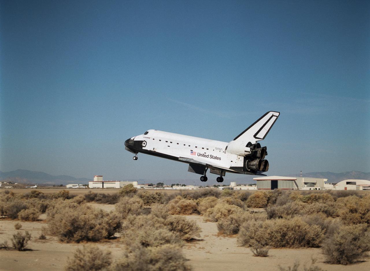 STS068-S-059 (11 October 1994) --- With its main landing gear not quite on the runway, the Space Shuttle Endeavour wraps up an eleven-day mission at Edwards Air Force Base, California.  Landing occurred at 10:02 a.m. (PDT), October 11, 1994.  Onboard were astronauts Michael A. Baker, mission commander; Terrence W. Wilcutt, pilot; Thomas D. Jones, payload commander; and Daniel W. Bursch, Peter J. K. (Jeff) Wisoff and Steven L. Smith, all mission specialists.