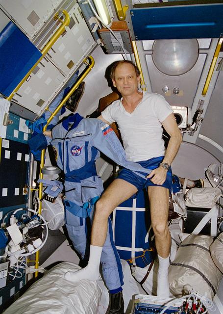 NASA image: Astronaut Thagard displays flight suit on Mir space station
