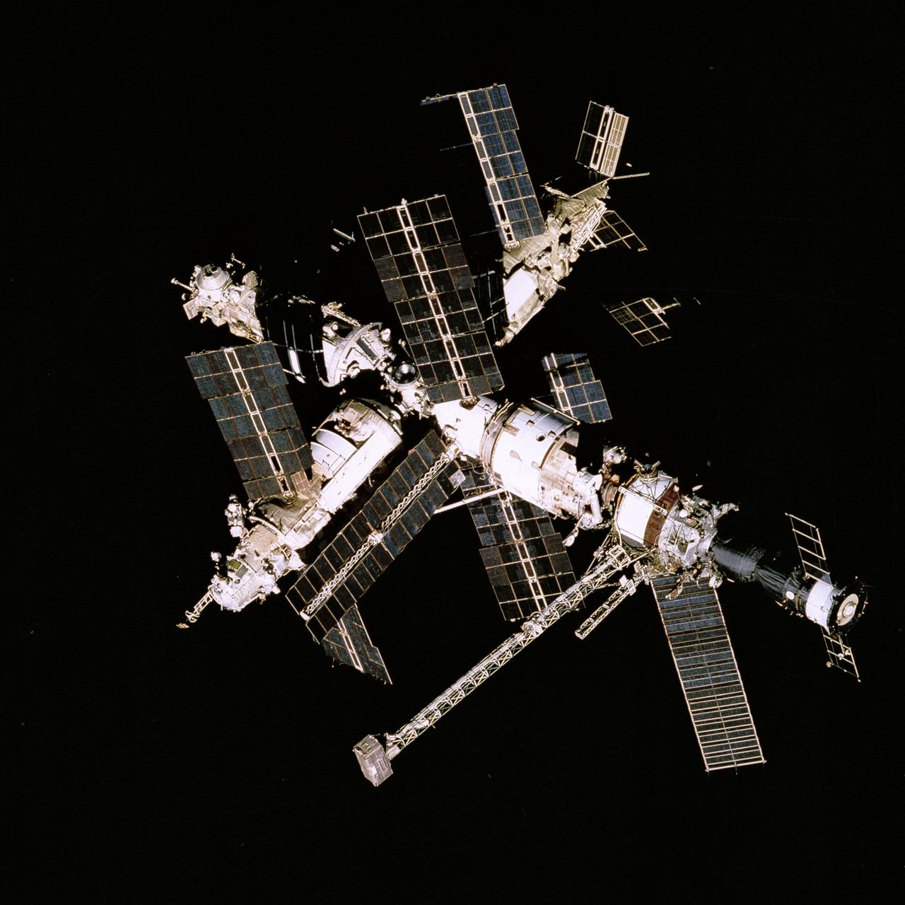 STS071-744-017 (29 June 1995) --- Russia's Mir Space Station is backdropped against the darkness of space, as photographed from the approaching space shuttle Atlantis on June 29, 1995.  Five NASA astronauts and two cosmonauts were onboard Atlantis as it approached the Mir, which has been home for the three-member Mir-18 crew since March of this year.
