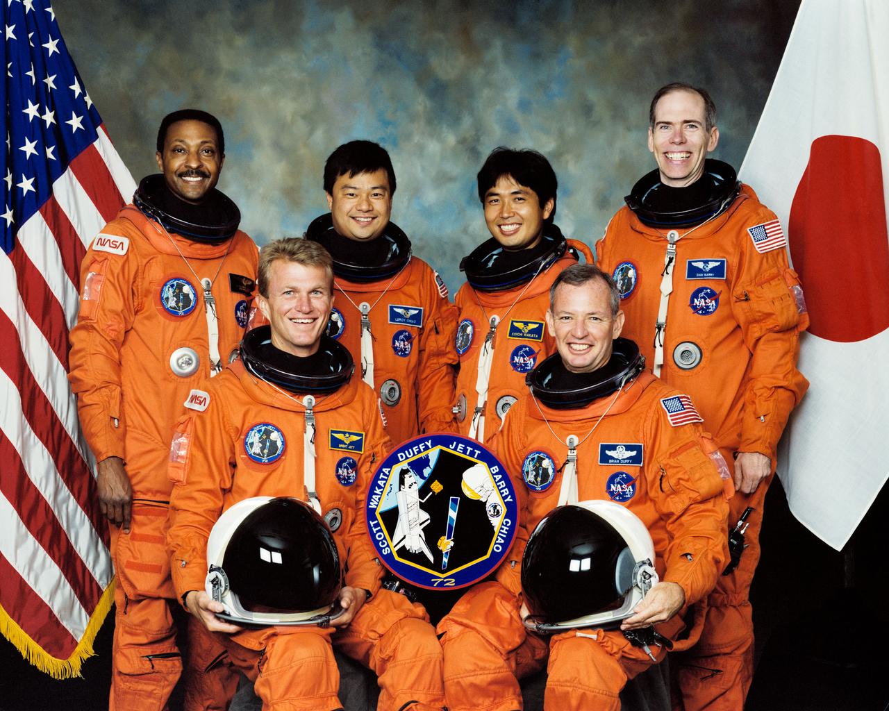 STS072-S-002 (August 1995) --- These six astronauts are in training for their mission scheduled aboard the Space Shuttle Endeavour later this year.  Astronauts Brian Duffy (right front) and Brent W. Jett (left front) are mission commander and pilot, respectively.  Mission specialists (back row, left to right) are Winston E. Scott, Leroy Chiao, Koichi Wakata and Daniel T. Barry.  Wakata is an international mission specialist representing Japan’s National Space Development Agency (NASDA) based at the Johnson Space Center (JSC).