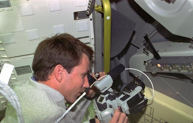 NASA image: CGBA, Pilot Kent Rominger films HHDTC units in Spacelab