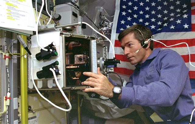 NASA image: OTFE, Payload Specialist Fred Leslie works in Spacelab