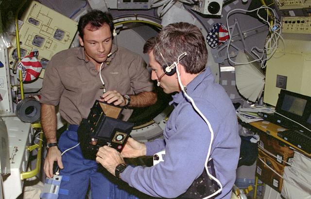 NASA image: FSDC, Astronauts Mike Lopez-Alegria and Fred Leslie perform IFM on experiment