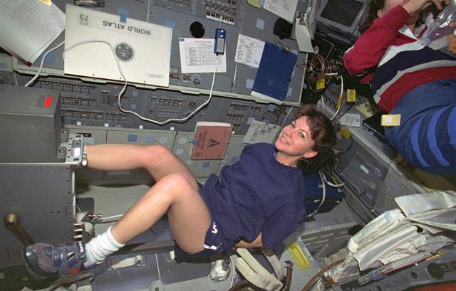 NASA image: Mission Specialist Catherine "Cady" Coleman exercises on the bicycle ergometer