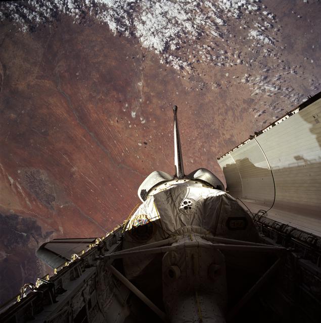 NASA image: Payload bay with Spacelab backdropped by Earth