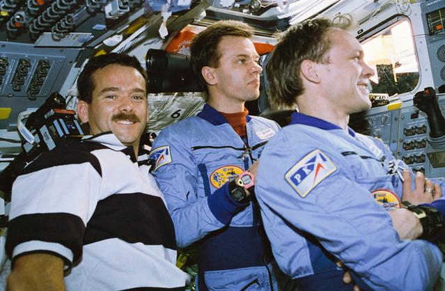 NASA image: Astronaut Hadfield and Mir 20 crewmembers on Atlantis aft flight deck