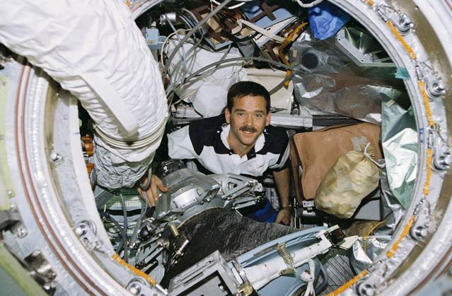 NASA image: Astronaut Hadfield makes his way onboard Mir space station