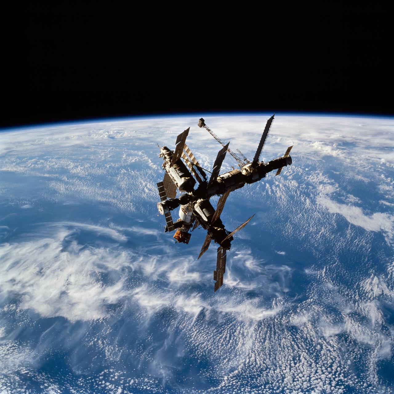 STS074-716-021 (18 Nov 1995) --- With Earth?s horizon providing the backdrop, this is the Russia?s Mir Space Station as seen from the Space Shuttle Atlantis, soon after the two spacecraft began their relative separation on November 18, 1995.  With five NASA astronauts aboard the Space Shuttle Atlantis, the flight began with a November 12, 1995, launch from Kennedy Space Center (KSC) and ended with landing there on November 20, 1995.  The STS-74 crew members were astronauts Kenneth D. Cameron, mission commander; James D. Halsell Jr., pilot; William S. McArthur Jr., Jerry L. Ross and Canadian astronaut Chris A. Hadfield, all mission specialists.  On November 15, 1995, the Space Shuttle Atlantis docked with the Mir Space Station, on which the STS-74 astronauts joined the Mir-20 crew.  The Mir-20 crew is composed of cosmonauts Yuriy P. Gidzenko, commander; and Sergei V. Avdeyev, engineer; along with the European Space Agency?s (ESA) Thomas Reiter, cosmonaut researcher.  Joint activities on the Mir Space Station and the Space Shuttle Atlantis ended November 18, 1995, when the two spacecraft separated.