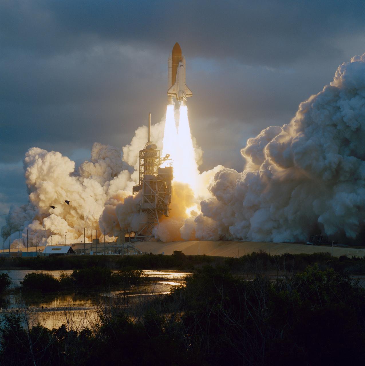 STS074-S-013 (12 Nov 1995) --- With five astronauts aboard, the Space Shuttle Atlantis lifts off from the Kennedy Space Center?s (KSC) Launch Pad 39A.  Launch occurred at 7:30:43:071 a.m. (EST), November 12, 1995.  The crew members were astronauts Kenneth D. Cameron, mission commander; James D. Halsell Jr., pilot; William S. McArthur Jr., Jerry L. Ross and Canadian astronaut Chris A. Hadfield, all mission specialists.  On November 15, 1995, the Space Shuttle Atlantis docked with Russia?s Mir Space Station, on which the NASA astronauts joined the Mir-20 crew.  The Mir-20 crew is composed of cosmonauts Yuriy P. Gidzenko, commander; and Sergei V. Avdeyev, engineer; along with the European Space Agency?s (ESA) Thomas Reiter, cosmonaut researcher.  Joint activities on the Mir Space Station and the Space Shuttle Atlantis ended on November 18, 1995, when the two spacecraft separated.  The November 20, 1995, landing also took place at KSC.