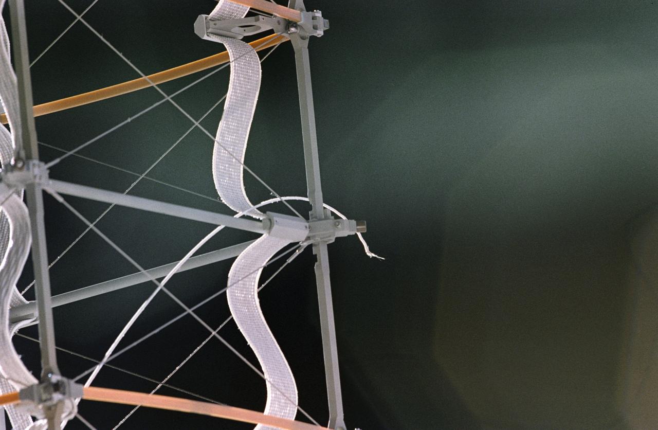 STS075-325-014 (25 Feb. 1996) --- The frayed end of the tether portion of the Tethered Satellite System (TSS) is seen at the end of the supportive boom. On February 25, 1996, the crew deployed the TSS, which later broke free. The seven member crew was launched aboard the Space Shuttle Columbia on February 22, 1996, and landed on March 9, 1996.  Crewmembers were Andrew M. Allen, mission commander; Scott J. Horowitz, pilot; Franklin R. Chang-Diaz, payload commander; and Maurizio Cheli, European Space Agency (ESA); Jeffrey A. Hoffman and Claude Nicollier (ESA), all mission specialists; along with payload specialist Umberto Guidoni of the Italian Space Agency (ASI).