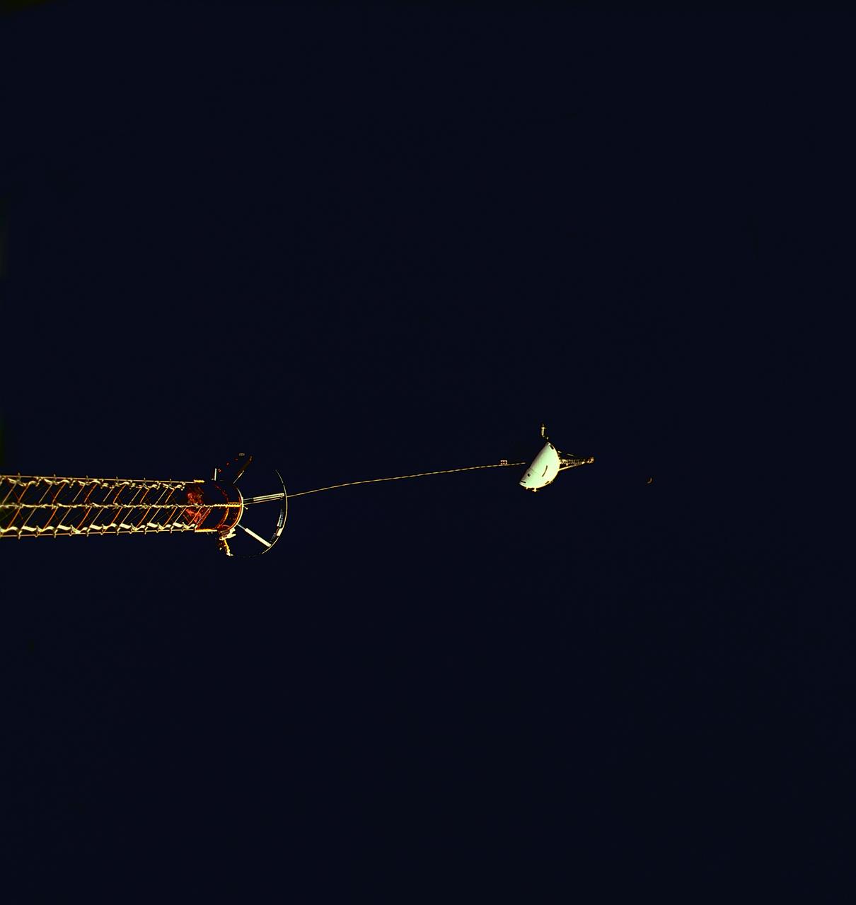 STS075-711-024 (25 Feb. 1996) --- The Tethered Satellite System (TSS) is seen as it is reeled out during early stages of deployment operations.  The crew deployed the TSS, which later broke free.  The seven member crew was launched aboard the space shuttle Columbia on Feb. 22, 1996, and landed on March 9, 1996. Crewmembers were Andrew M. Allen, mission commander; Scott J. Horowitz, pilot; Franklin R. Chang-Diaz, payload commander; and Maurizio Cheli European Space Agency (ESA); Jeffrey A. Hoffman and Claude Nicollier, ESA, all mission specialists; along with payload specialist Umberto Guidoni of the Italian Space Agency (ASI).