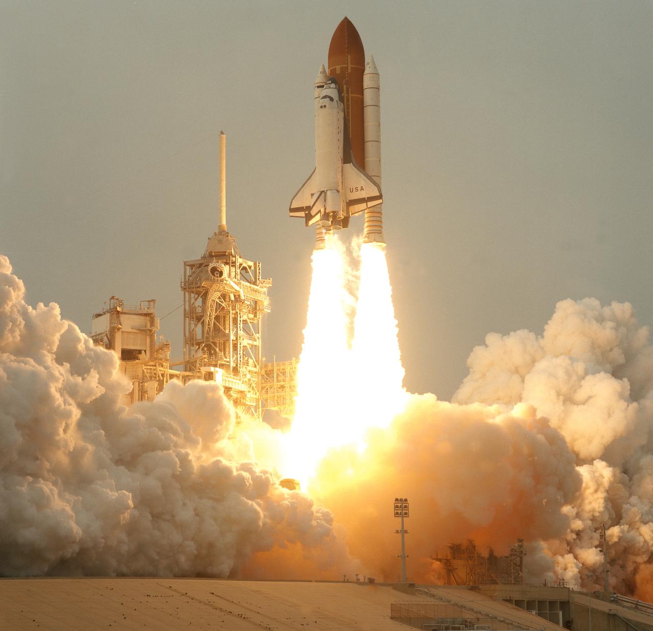 STS075-S-007 (22 Feb. 1996) --- A remote camera at Launch Pad 39B, at the Kennedy Space Center (KSC), recorded this profile view of the space shuttle Columbia as it cleared the tower to begin the mission.  The liftoff occurred on schedule at 3:18:00 p.m. (EST), Feb. 22, 1996.  Onboard Columbia for the scheduled two-week mission were astronauts Andrew M. Allen, commander; Scott J. Horowitz, pilot; Franklin R. Chang-Diaz, payload commander; and astronauts Maurizio Cheli, Jeffrey A. Hoffman and Claude Nicollier, along with payload specialist Umberto Guidoni. Cheli and Nicollier represent the European Space Agency (ESA), while Guidoni represents the Italian Space Agency (ASI).
