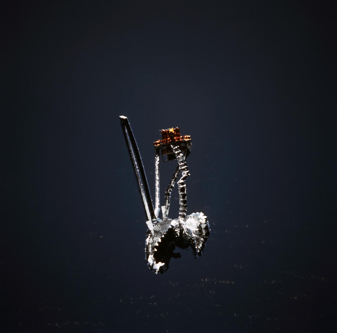 STS077-705-012 (20 May 1996) --- Following its deployment from the Space Shuttle Endeavour, the Inflatable Antenna Experiment (IAE) portion of the Spartan 207 payload is backdropped over Earth as it continues its inflation process.  The view was photographed with a handheld 70mm camera during the first full day of orbital operations by the six-member crew.  Managed by Goddard Space Flight Center (GSFC), Spartan is designed to provide short-duration, free-flight opportunities for a variety of scientific studies.  The Spartan configuration on this flight is unique in that the IAE is part of an additional separate unit which is ejected once the experiment is completed.  The IAE experiment will lay the groundwork for future technology development in inflatable space structures, which will be launched and then inflated like a balloon on-orbit.