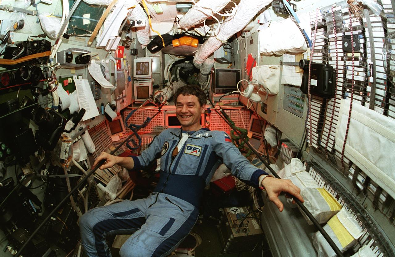 STS079-353-023 (16-26 Sept. 1996) --- Cosmonaut Valeri Korzun, Mir-22 commander, is pictured near the camera rack on the Russian Mir Space Station's Base Block Module.  The photograph was taken by astronaut Shannon W. Lucid.  She later told an assembly of her Houston co-workers that she was able to experience the unique opportunity of serving with four different mission commanders in a span of approximately six months.  Cosmonauts Korzun and Aleksandr Kaleri, flight engineer, had earlier welcomed astronaut John E. Blaha aboard Mir as Lucid's replacement as cosmonaut guest researcher.
