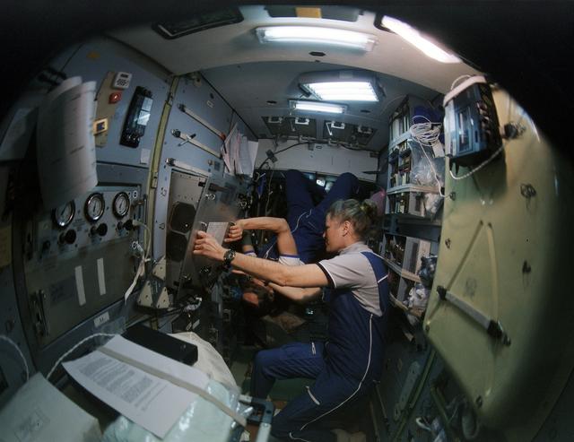 NASA image: MS Lucid places samples in the TEHOF aboard the Spektr module