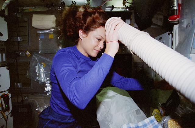 NASA image: Crewmember activity in the shuttle middeck