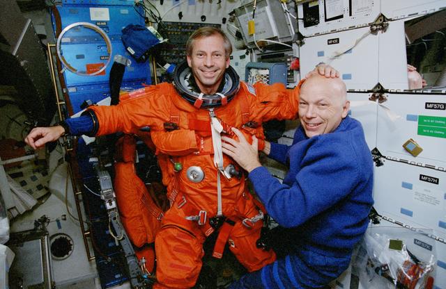 NASA image: Crewmember activity in the flight deck and middeck