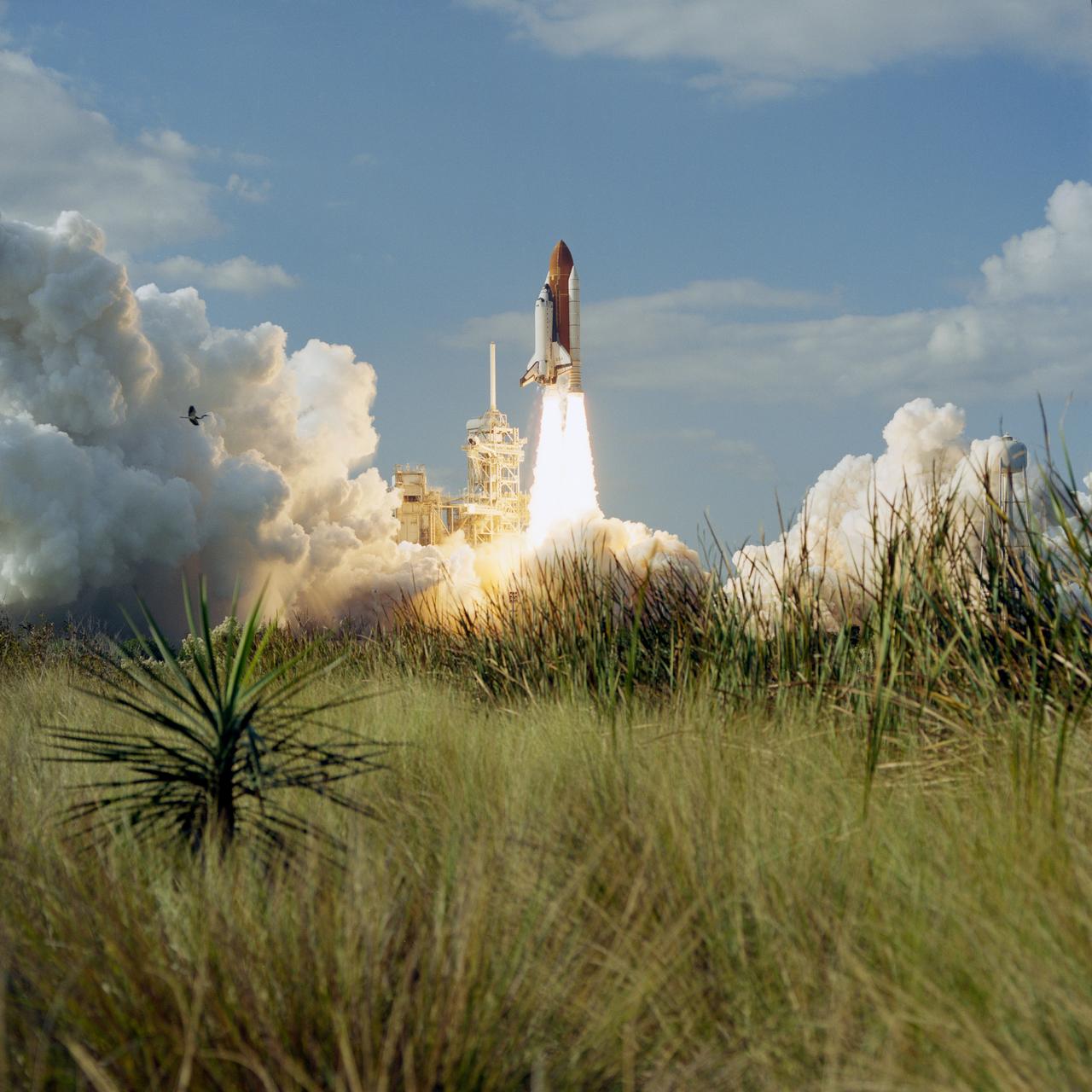 STS080-S-005 (19 Nov. 1996) --- The space shuttle Columbia lifts off from the Kennedy Space Center's (KSC) Launch Pad 39B at 2:55:47 p.m. (EST), Nov. 19, 1996. Onboard are astronauts Kenneth D. Cockrell, mission commander; Kent V. Rominger, pilot; along with Story Musgrave, Tamara E. Jernigan and Thomas D. Jones, all mission specialists. The two primary payloads for STS-80 stowed in Columbia's cargo bay for later deployment and testing are the Wake Shield Facility (WSF-3) and the Orbiting and Retrievable Far and Extreme Ultraviolet Spectrometer (ORFEUS) with its associated Shuttle Pallet Satellite (SPAS).