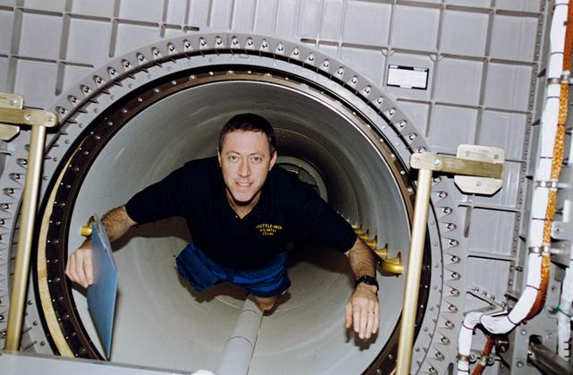 NASA image: Candid views of STS-81 Cmdr Baker in Spacehab module