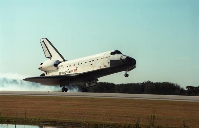 NASA image: The landing of STS-81 Atlantis, OV-104, on a runway at KSC's SLF