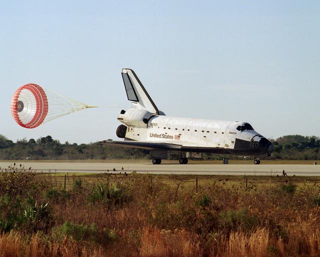 NASA image: The landing of STS-81 Atlantis, OV-104, on a runway at KSC's SLF